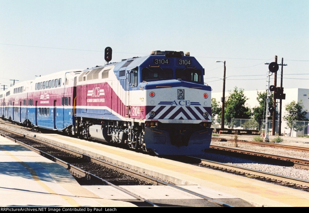 Altamont Commuter Express shoves east out of the station